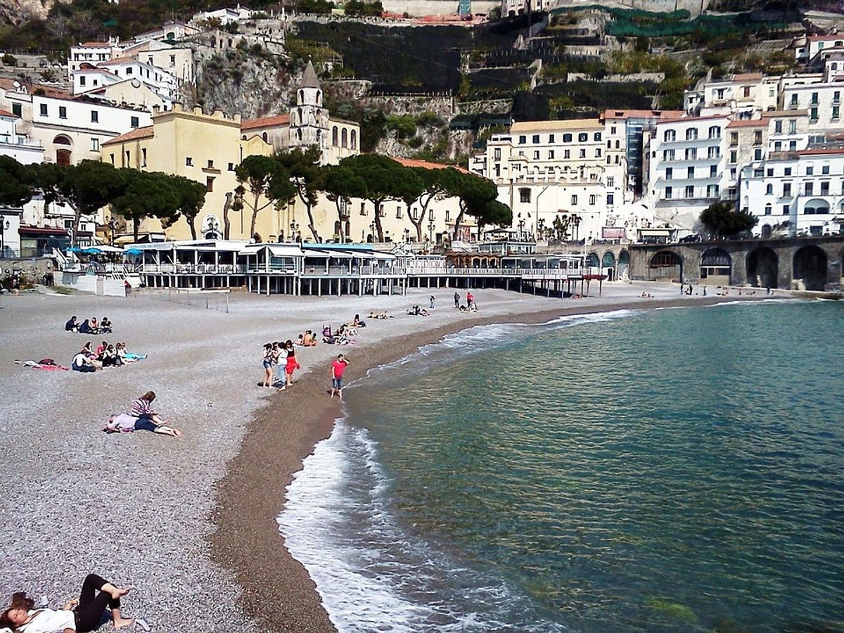 scenic coastal road from Naples to Amalfi with cliffs and sea
